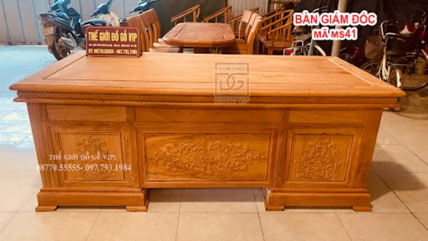 Sử dụng bàn giám đốc gỗ hương sẽ giúp nâng tầm của lãnh đạo